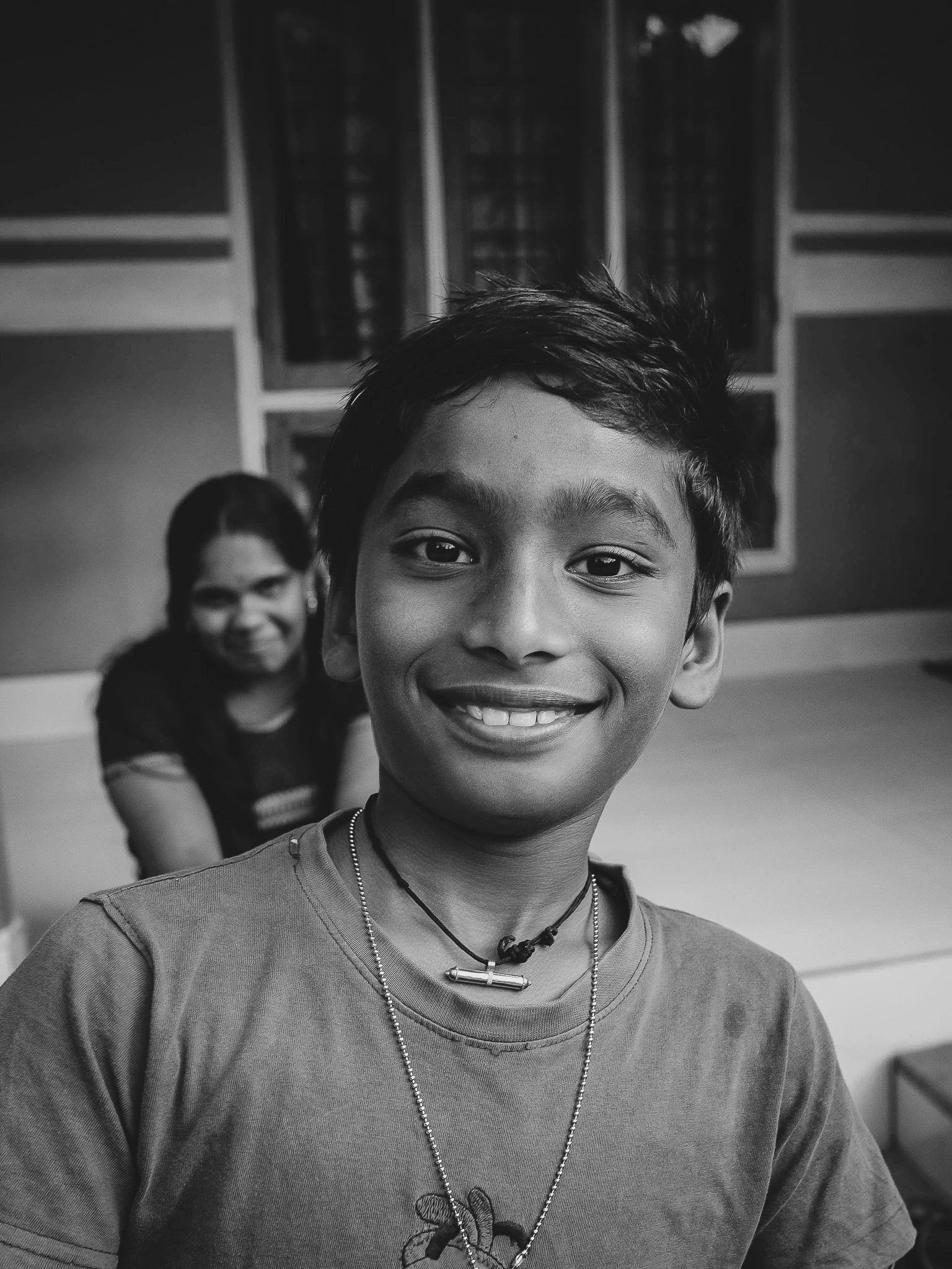 Portrait of a young boy in Jaipur, India, photographed during everyday street life.
