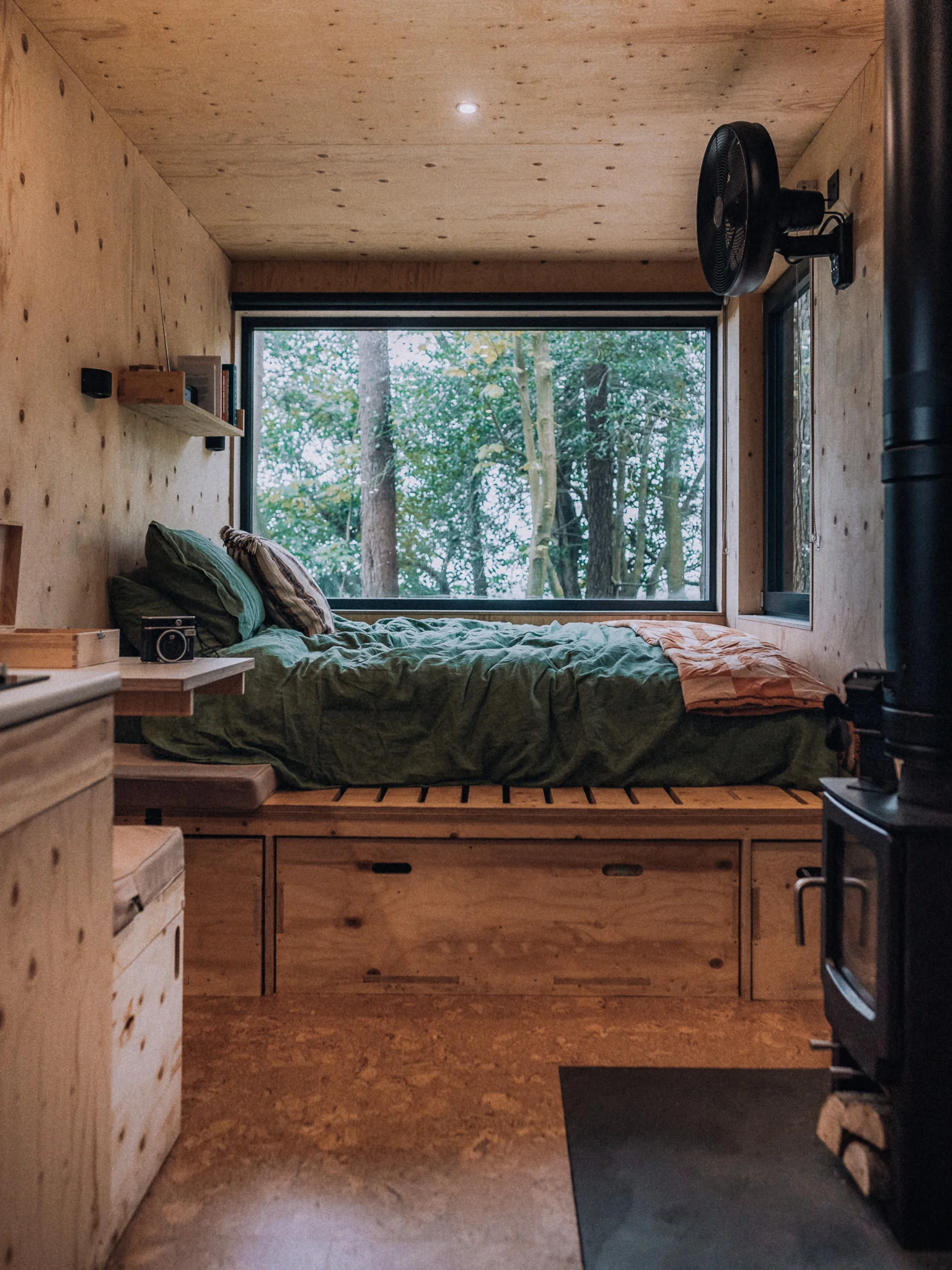 Cosy interior of the Unplugged Mabel cabin in East Sussex