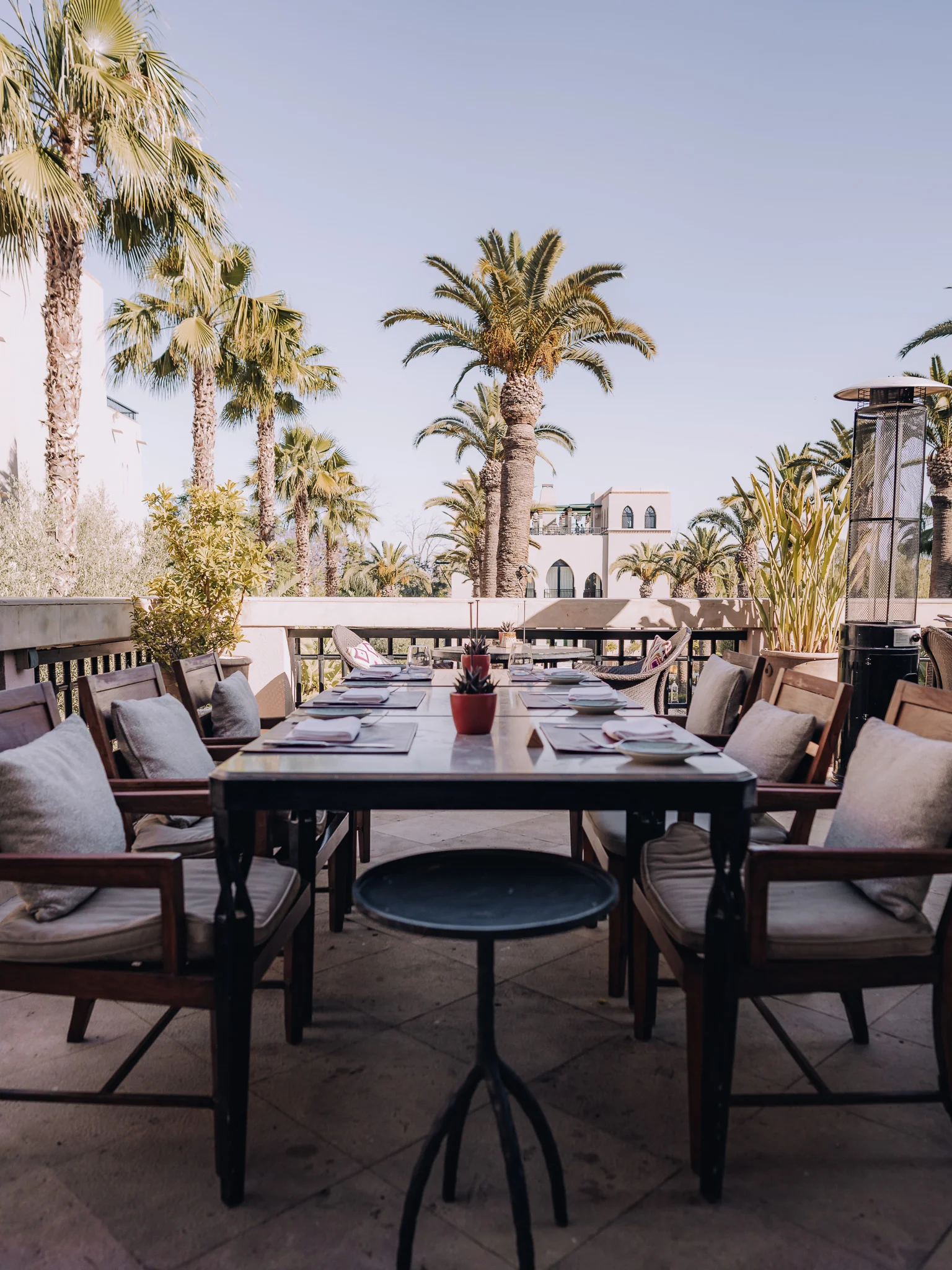 able setting on the Inara balcony at sunset Four Seasons Marrakech