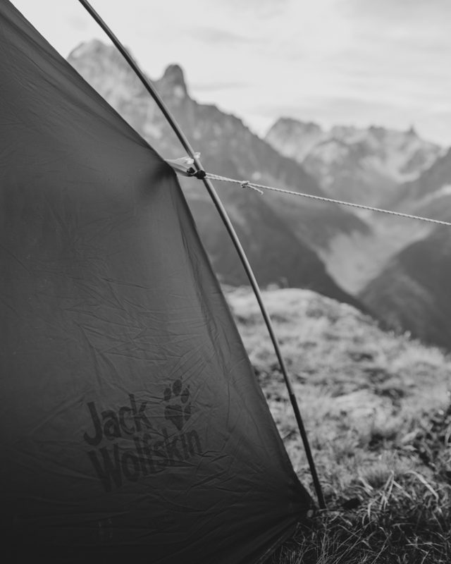 Jack Wolfskin tent is pitched high in the mountains.