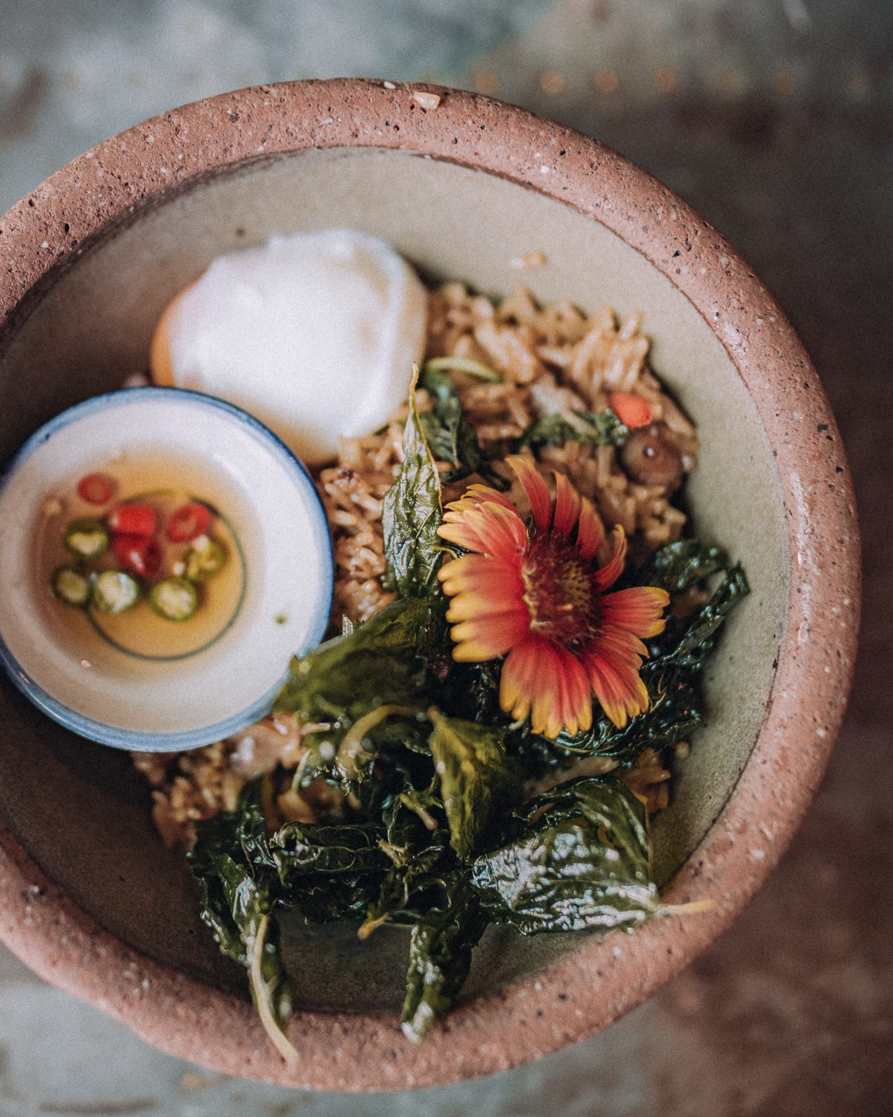 A colourful asian dish with chillies.