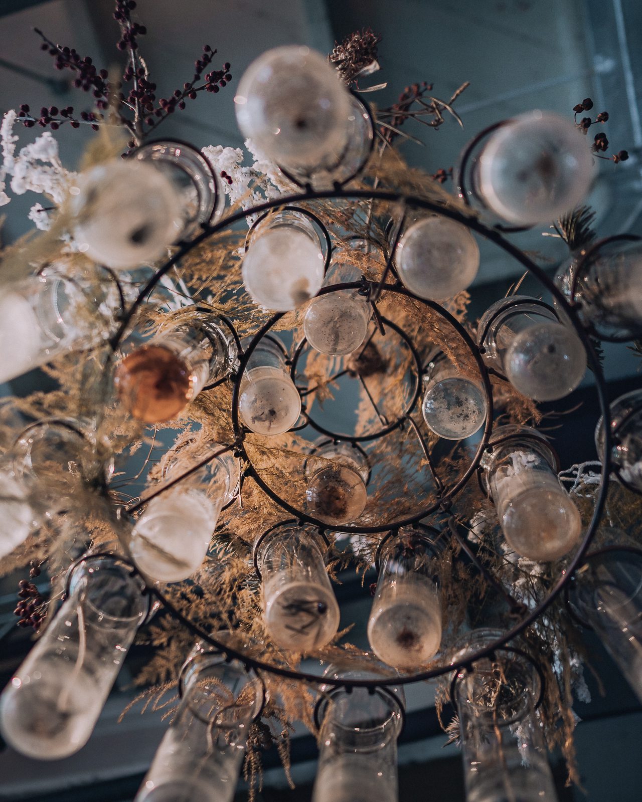 Shabby vintage glass bottle light chandelier.