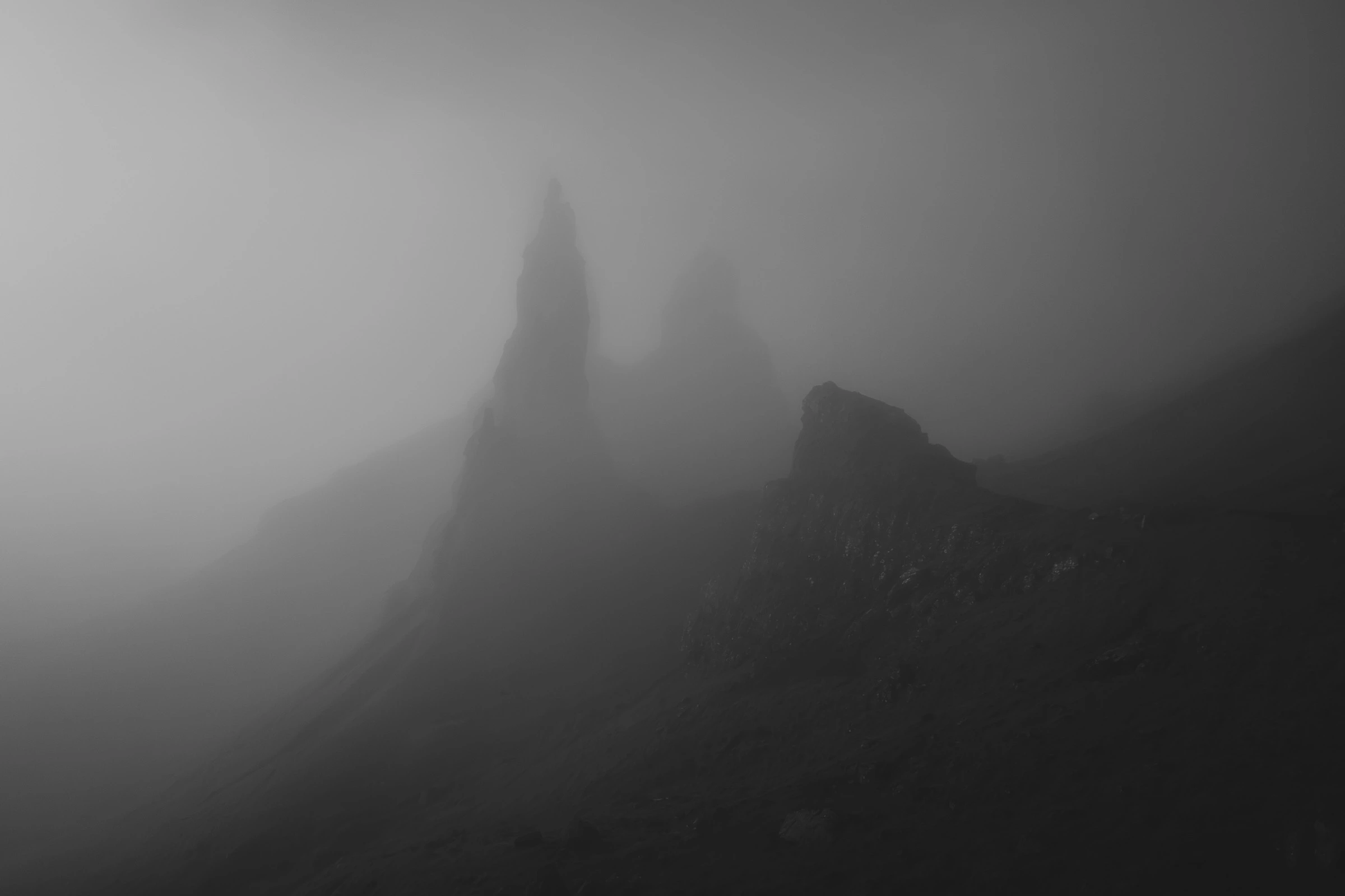 Dramatic black and white picture of Old Man of Storr on the Isle of Skye