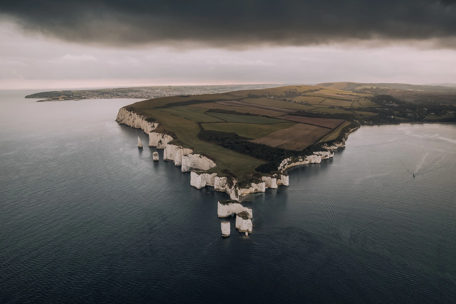 Sunrise drone photo over the Old Harrys rock in dorset, England.