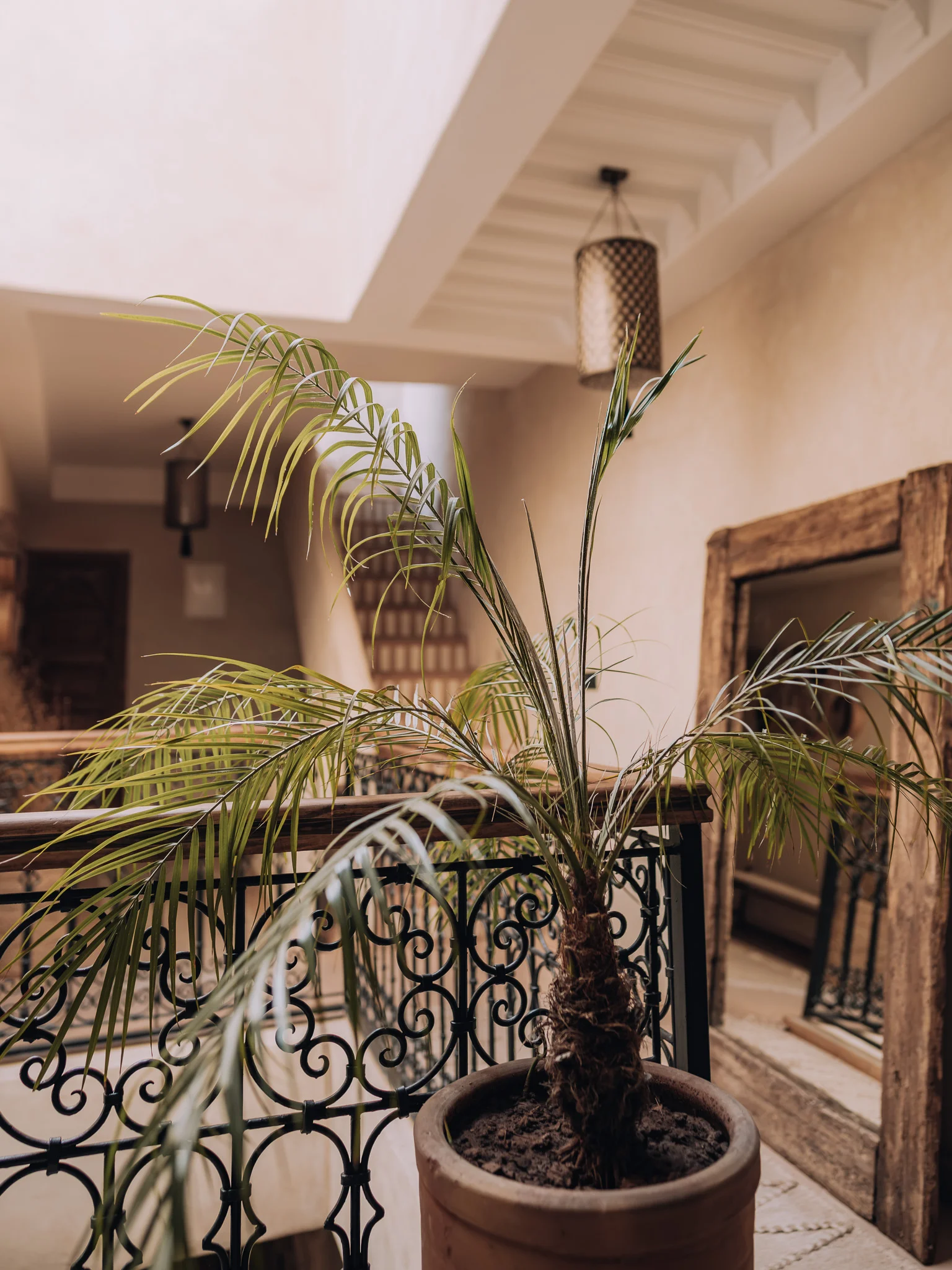 Elegant boutique hallways with traditional Moroccan details at Riad Solange.