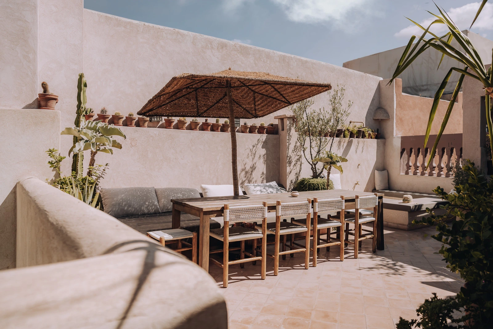 Table and chairs on the rooftop terrace at Riad Solange in Marrakech