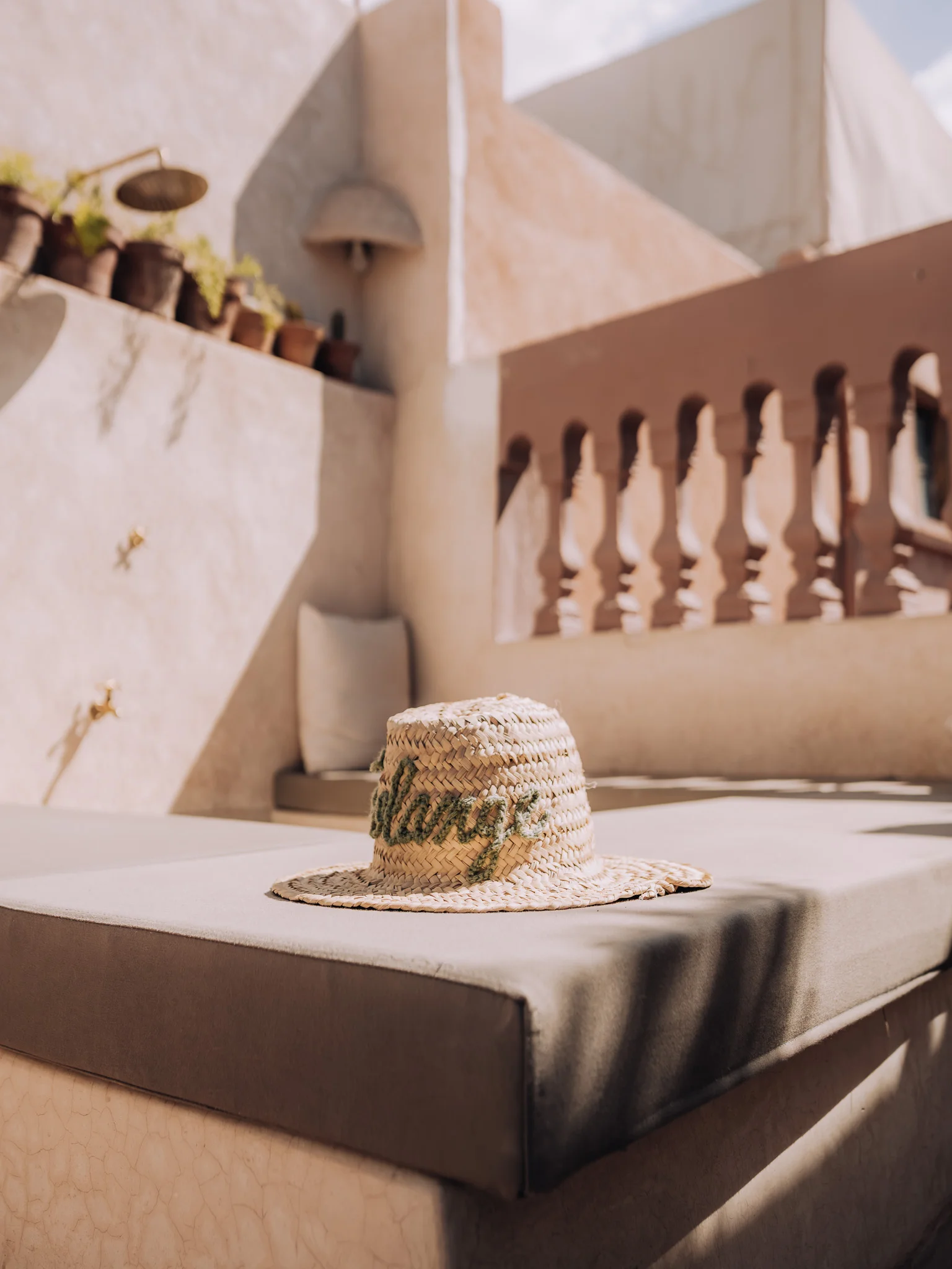 Straw hat resting at Riad Solange in Marrakech
