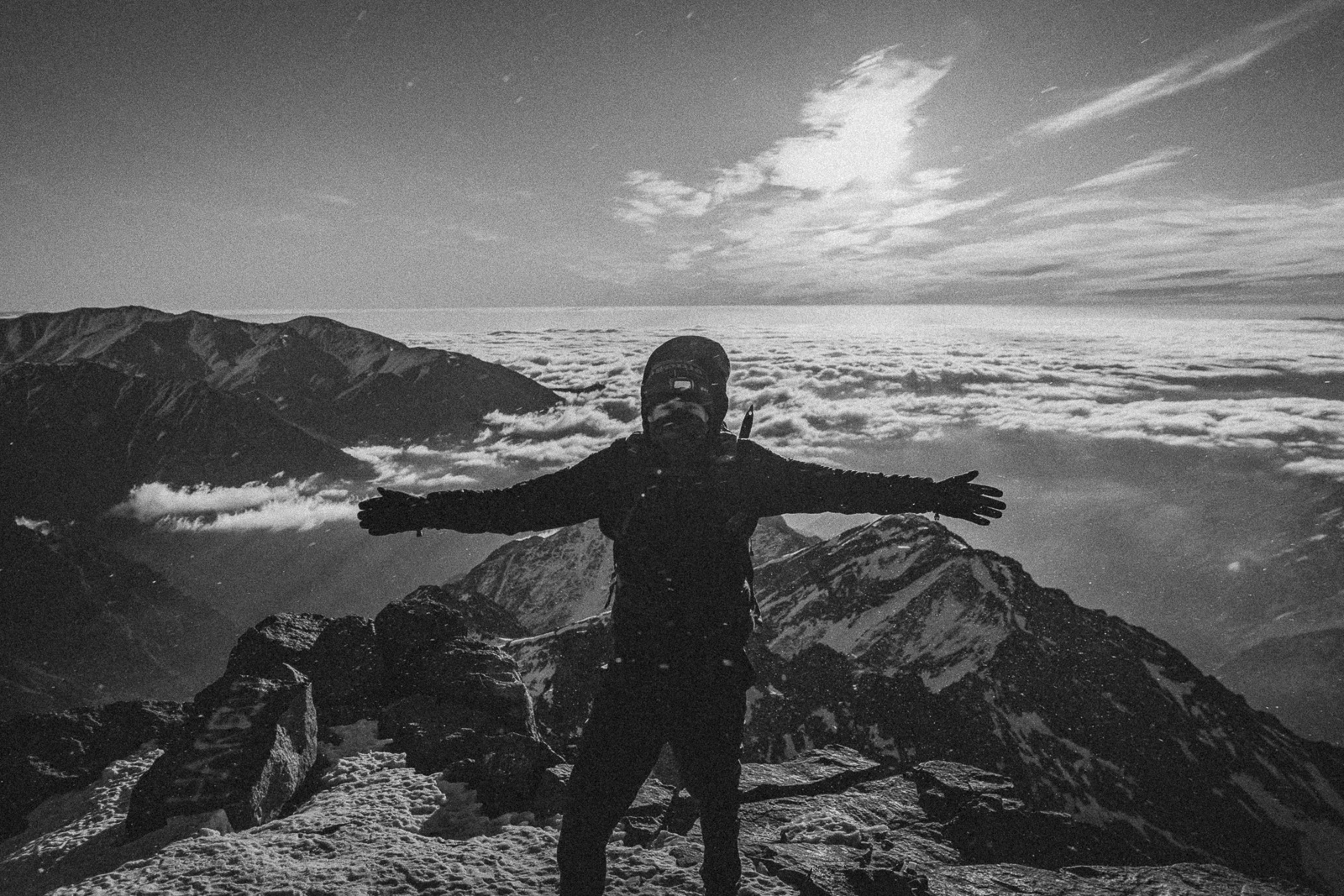 Me standing near the summit with mountain view