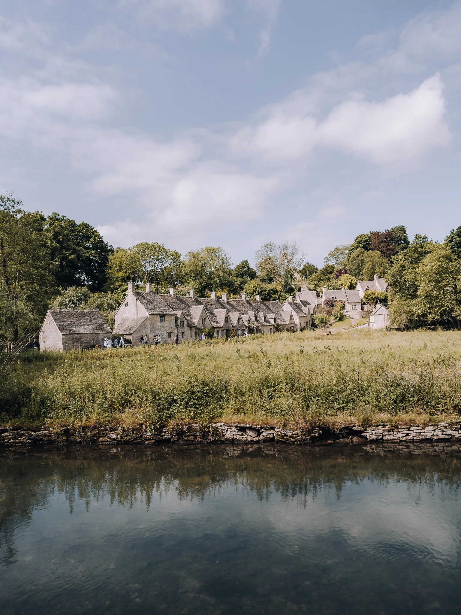 Arlington Row cottages overlooking the river in Bibury, Cotswolds