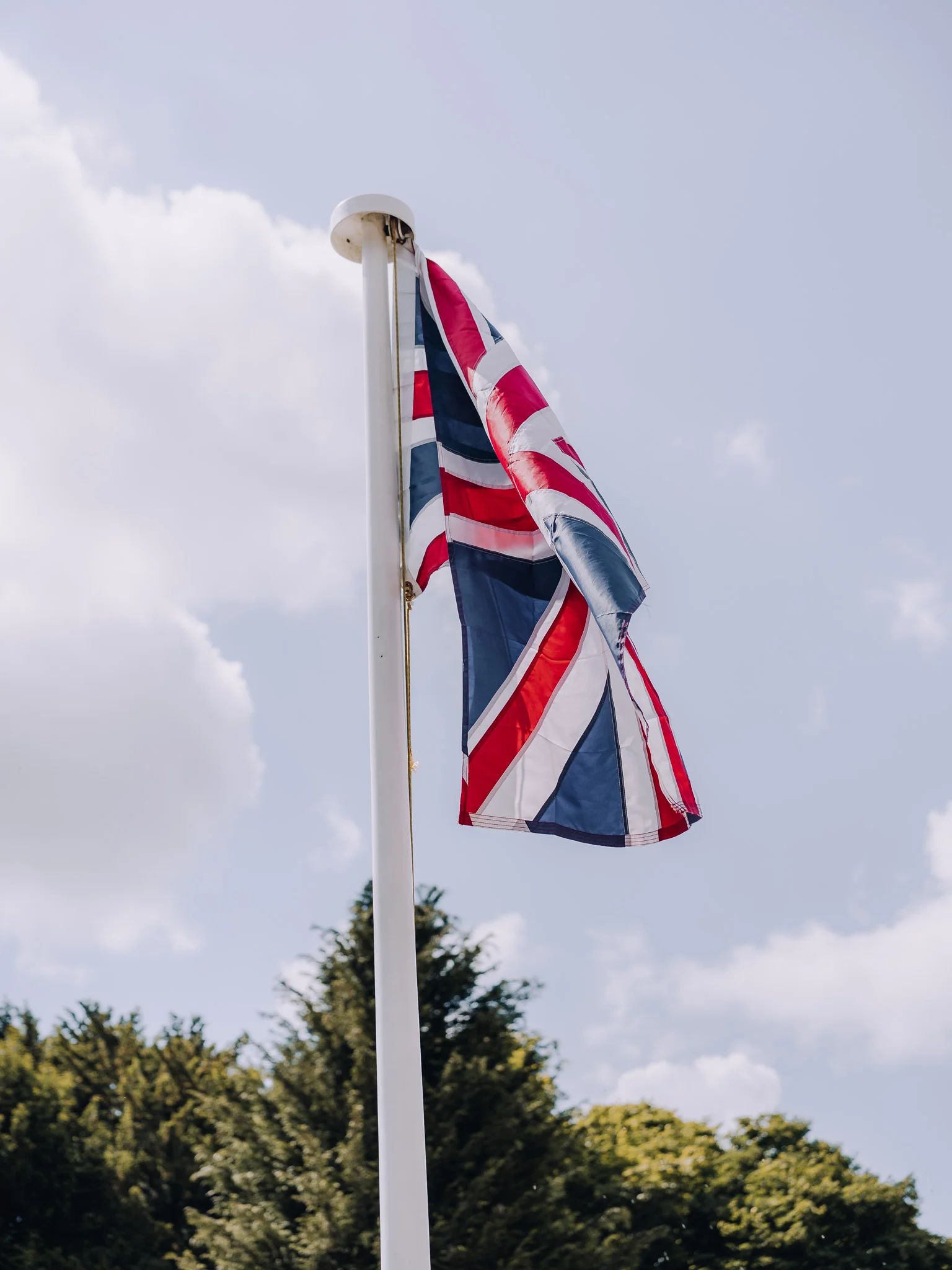 UK flag flying in Bibury in the Cotswolds